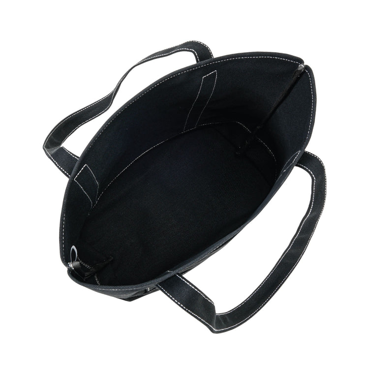 Black leather handbag with handles on a white background