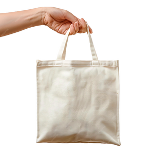 Hand holding a beige tote bag on a white background
