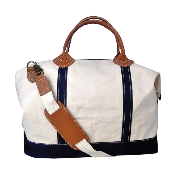 White bag with brown handles and strap on a white background