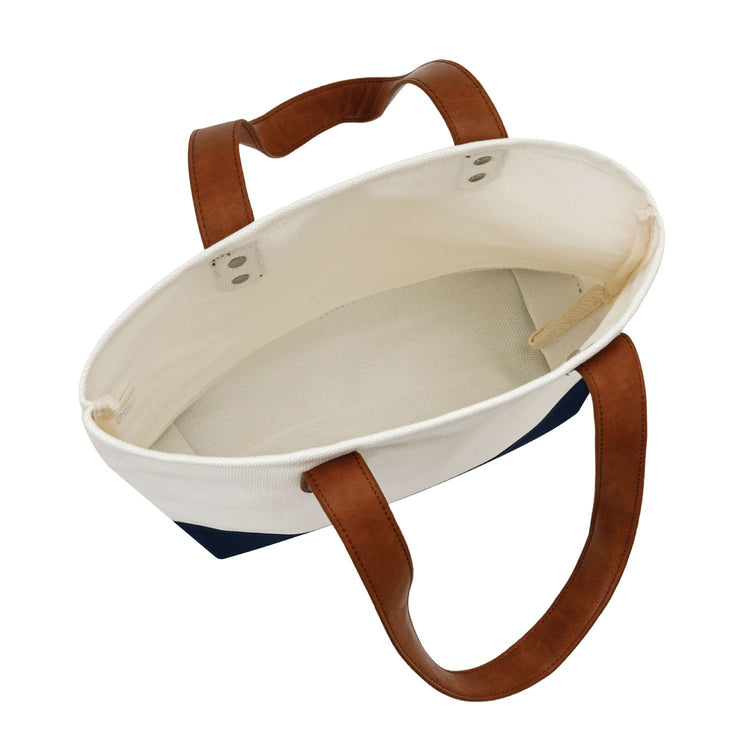 White baby bassinet with brown leather straps on a white background