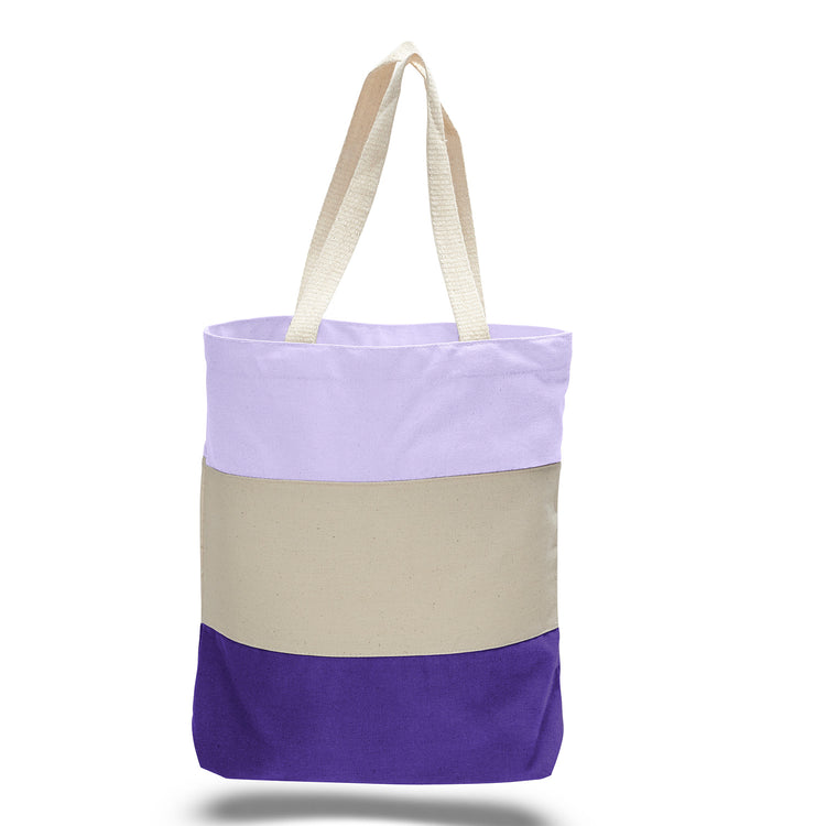 Tote bag with a lavender beige, deep purple horizontal tri-tone colour block design on a white background