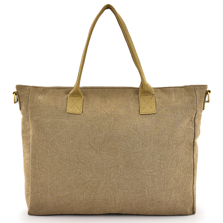 Beige tote bag with gold handles on a white background