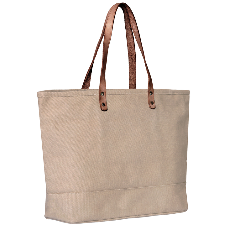 Beige tote bag with brown handles on a white background