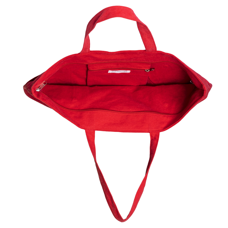 Red bag with a strap on a white background