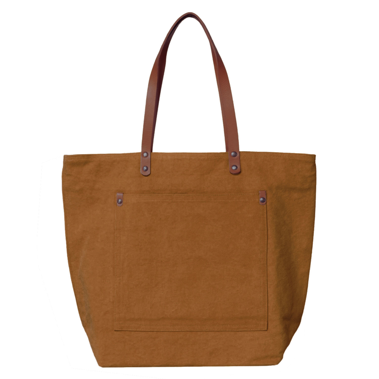 Brown tote bag with leather handles on a white background