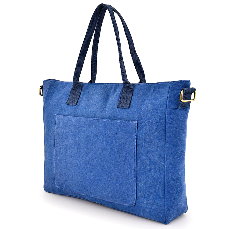 Blue tote bag with a pocket on a white background