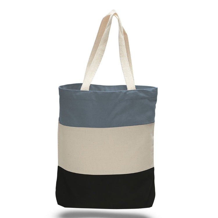 Tote bag with a powder blue, beige, black horizontal tri-tone colour block design on a white background