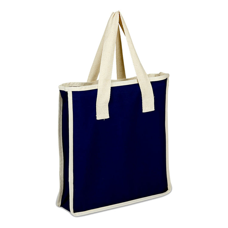 Navy blue tote bag with cream handles on a white background