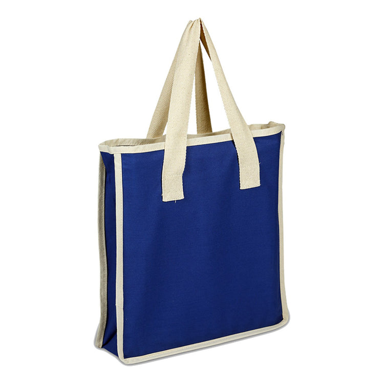 Blue tote bag with beige handles on a white background