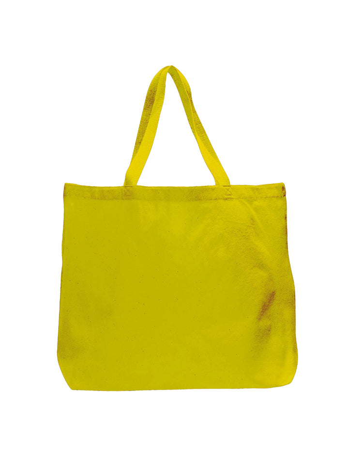 Yellow tote bag with a visible stain on a white background