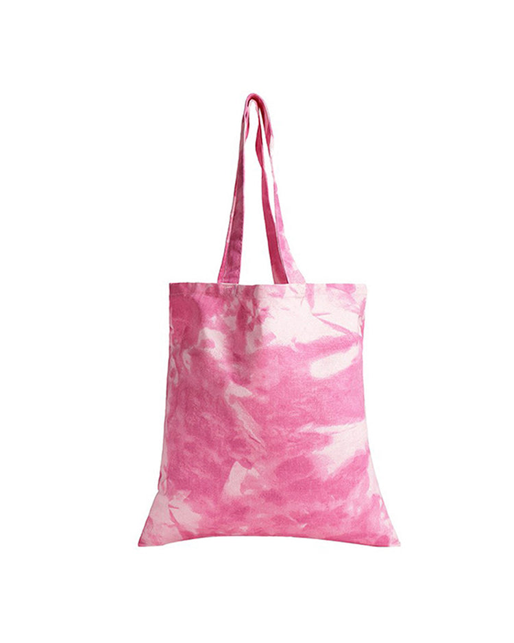 Pink and white tie-dye tote bag on a white background