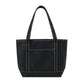Black tote bag with white stitching on a white background